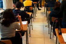 Students sitting at desks in a classroom