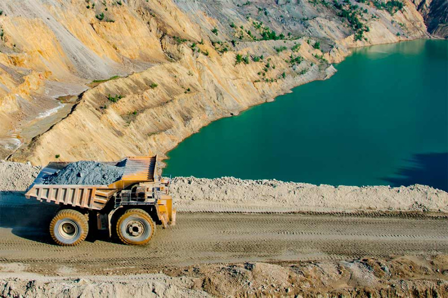 Dump truck moves through mining center