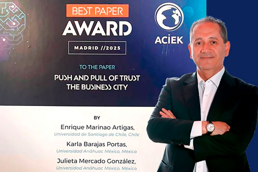 Afiche que anuncia el premio recibido por el profesor Enrique Marinao-Artigas