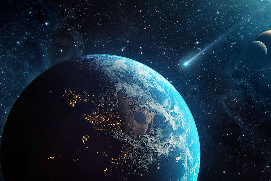 La Tierra visto desde el espacio junto a un cometa que pasa por el cielo.